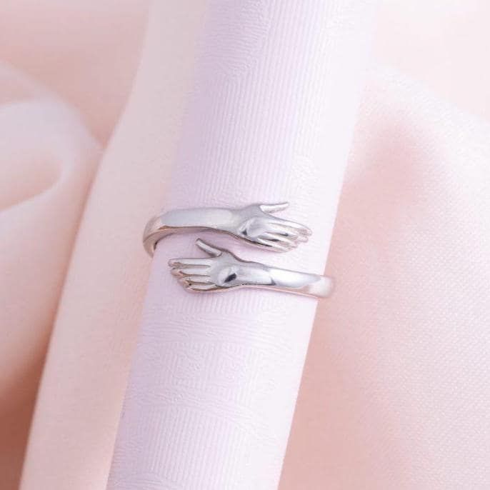 The signature Hug Promise Ring, the featured product of the Confession Box online store.